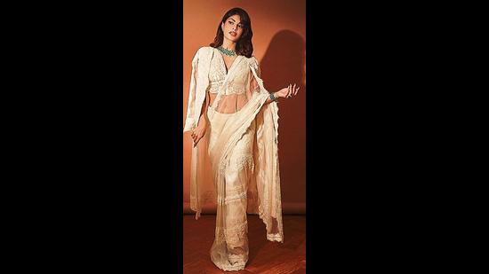 Channel your innate elegance and charm by donning this sheer white saree and embroidered bralette-style blouse like Jacqueline Fernandez Channel your innate elegance and charm by donning this sheer white saree and embroidered bralette-style blouse like Jacqueline Fernandez