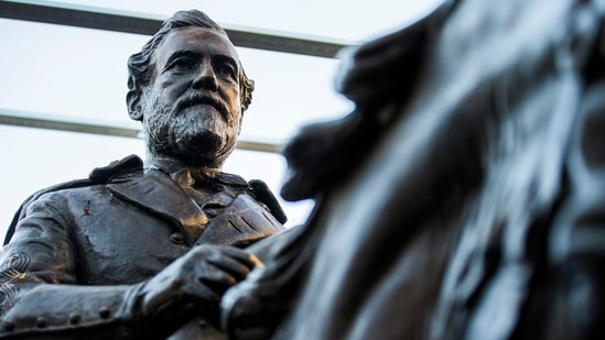 The 1935 statue of Confederate Gen. Robert E. Lee, by sculptor Alexander Phimister, sits in storage at Hensley Field, the former Naval Air Station on the west side of Mountain Creek Lake in Dallas. The statue of Lee, which the city of Dallas removed from a park and later sold in an online auction, is now on display at a golf resort in West Texas, the Houston Chronicle reported&nbsp;(Ashley Landis/The Dallas Morning News via AP, File)