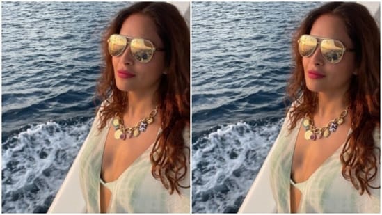 Late on Thursday, Bipasha shared a slew of pictures of herself decked up for a cruise ride to watch the sunset over the waters.(Instagram/@bipashabasu)