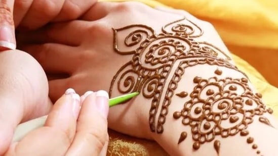 Mehendi is a significant part of wedding rituals and festivals in India.(Shutterstock)