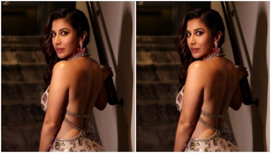 She opted for a cream white and gold embellished long gown from the designer’s wardrobe.(Instagram/@sophiechoudry)