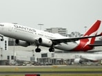 A Qantas plane takes off from the Sydney International airport (File Photo/AFP) A Qantas plane takes off from the Sydney International airport (File Photo/AFP)