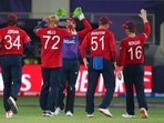 England's Tymal Mills, (72), celebrates after taking the wicket of West Indies' Nicholas Pooran caught out by England's Jos Buttler during the Cricket T20 World Cup match between England and the West Indies at the Dubai International Cricket Stadium, in Dubai, UAE, Saturday, Oct. 23, 2021 England's Tymal Mills, (72), celebrates after taking the wicket of West Indies' Nicholas Pooran caught out by England's Jos Buttler during the Cricket T20 World Cup match between England and the West Indies at the Dubai International Cricket Stadium, in Dubai, UAE, Saturday, Oct. 23, 2021