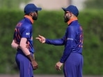 India's captain Virat Kohli, right, talks with teammate Hardik Pandya during the Cricket Twenty20 World Cup(AP) India's captain Virat Kohli, right, talks with teammate Hardik Pandya during the Cricket Twenty20 World Cup(AP)