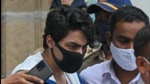 File photo: Aryan Khan, son of Bollywood actor Shah Rukh Khan, is escorted to court by Narcotics Control Bureau (NCB) officials for a bail plea hearing. (AFP) File photo: Aryan Khan, son of Bollywood actor Shah Rukh Khan, is escorted to court by Narcotics Control Bureau (NCB) officials for a bail plea hearing. (AFP)