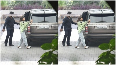 Alia teamed her shirt with a pair of grey cotton trousers. (HT Photos/Varinder Chawla) Alia teamed her shirt with a pair of grey cotton trousers. (HT Photos/Varinder Chawla)