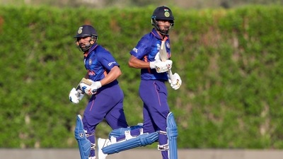 India's Rohit Sharma (left), and KL Rahul run between the wickets during the T20 World Cup warm-up match between India and Australia in Dubai. (AP) India's Rohit Sharma (left), and KL Rahul run between the wickets during the T20 World Cup warm-up match between India and Australia in Dubai. (AP)