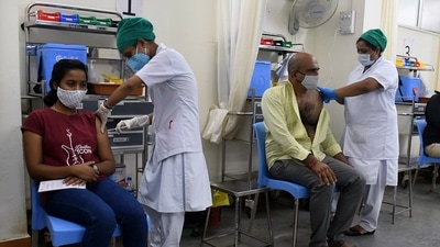 People get a shot of the Covid-19 vaccine during a vaccination drive at Nair Hospital in Mumbai (ANI). People get a shot of the Covid-19 vaccine during a vaccination drive at Nair Hospital in Mumbai (ANI). 