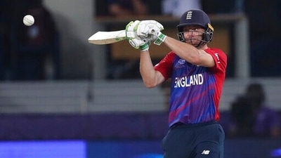 England's Jos Buttler hits runs during the Cricket T20 World Cup match between England and the West Indies at the Dubai International Cricket Stadium, in Dubai, UAE, Saturday, Oct. 23, 2021.England won the match by 6 wickets . (AP Photo/Aijaz Rahi) (AP) England's Jos Buttler hits runs during the Cricket T20 World Cup match between England and the West Indies at the Dubai International Cricket Stadium, in Dubai, UAE, Saturday, Oct. 23, 2021.England won the match by 6 wickets . (AP Photo/Aijaz Rahi) (AP)