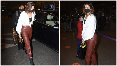 Side parted open locks, winged eyeliner, and minimal make-up completed Deepika's glam. We loved the pointed black pumps teamed with matching stockings. (HT Photo/Varinder Chawla) Side parted open locks, winged eyeliner, and minimal make-up completed Deepika's glam. We loved the pointed black pumps teamed with matching stockings. (HT Photo/Varinder Chawla)