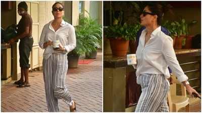 Not just this, Kareena also added a trendy pair of glares and a silver watch to complete her ensemble. With her hair neatly tied up tresses in a high bun and a cup of morning coffee in her hand, Kareena strutted towards her car. (HT Photo/Varinder Chawla) Not just this, Kareena also added a trendy pair of glares and a silver watch to complete her ensemble. With her hair neatly tied up tresses in a high bun and a cup of morning coffee in her hand, Kareena strutted towards her car. (HT Photo/Varinder Chawla)