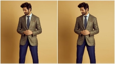 He chose a contrasting blue pair of trousers to complete his look. (Instagram/@kartikaaryan) He chose a contrasting blue pair of trousers to complete his look. (Instagram/@kartikaaryan)