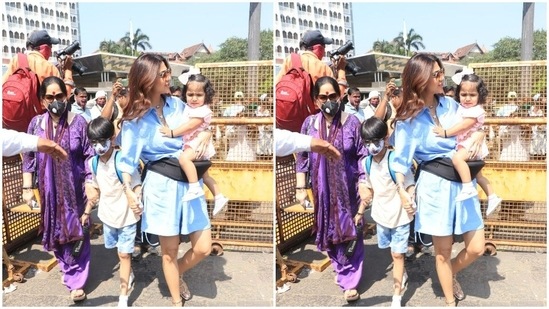 Shilpa and Alia’s weekend outfits gave us major summer fashion goals Shilpa carried Samisha in her arms and held Viaan’s hands as she made her way towards the tourist attraction.(HT Photos/Varinder Chawla)