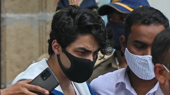 File photo: Aryan Khan, son of Bollywood actor Shah Rukh Khan, is escorted to court by Narcotics Control Bureau (NCB) officials for a bail plea hearing. (AFP) File photo: Aryan Khan, son of Bollywood actor Shah Rukh Khan, is escorted to court by Narcotics Control Bureau (NCB) officials for a bail plea hearing. (AFP)