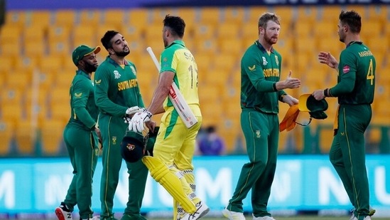 Australia endured some anxious moments before edging out South Africa by five wickets after their bowlers set it up with a clinical display in an ICC T20 World Cup match in Abu Dhabi on Saturday. (PTI)(AP)