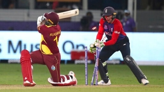 Emirates T20 World Cup Cricket 161 1635011084963 1635011249021 West Indies' Ravi Rampaul is clean bowled by England's Adil Rashid during the Cricket T20 World Cup match between England and the West Indies at the Dubai International Cricket Stadium, in Dubai, UAE, Saturday, Oct. 23, 2021. (AP)