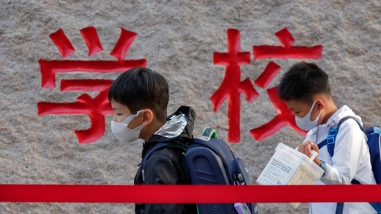 China has passed a new law to cut down on students’ homework and off-school tutoring, seeking to strike a balance between academics, rest and physical education, local media reported on Saturday.(AP) China has passed a new law to cut down on students’ homework and off-school tutoring, seeking to strike a balance between academics, rest and physical education, local media reported on Saturday.(AP)