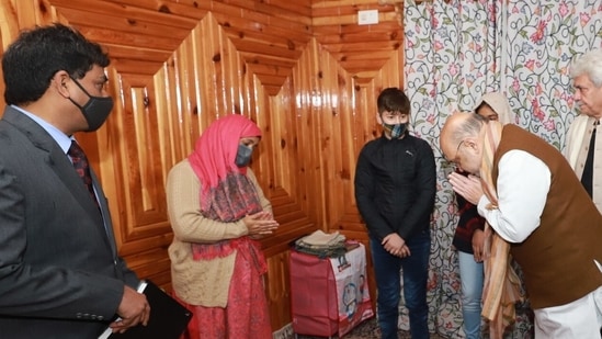 Union home minister Amit Shah meets family of slain J-K cop Parvez Ahmad (Twitter/@AmitShah)