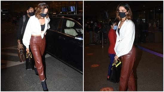 Side parted open locks, winged eyeliner, and minimal make-up completed Deepika's glam. We loved the pointed black pumps teamed with matching stockings.(HT Photo/Varinder Chawla)