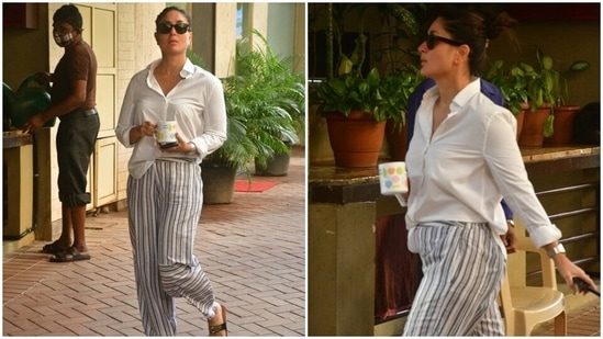 Not just this, Kareena also added a trendy pair of glares and a silver watch to complete her ensemble. With her hair neatly tied up tresses in a high bun and a cup of morning coffee in her hand, Kareena strutted towards her car.(HT Photo/Varinder Chawla)