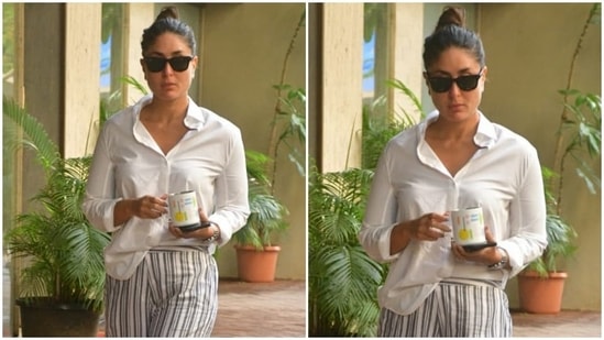 Bollywood actor Kareena Kapoor Khan began her weekend on a stylish note as she was snapped outside her house in Mumbai in a winning look. The actor never ceases to amaze us with her off-duty lookbook. And her latest ensemble - a white shirt with striped pants - is proof.(HT Photo/Varinder Chawla)