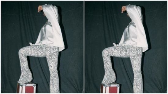 ‘In white,’ Mrunal Thakur is a imaginative and prescient to behold 3 With one leg on a wooden box of sorts, Mrunal posed for the pictures.(Instagram/@mrunalthakur)