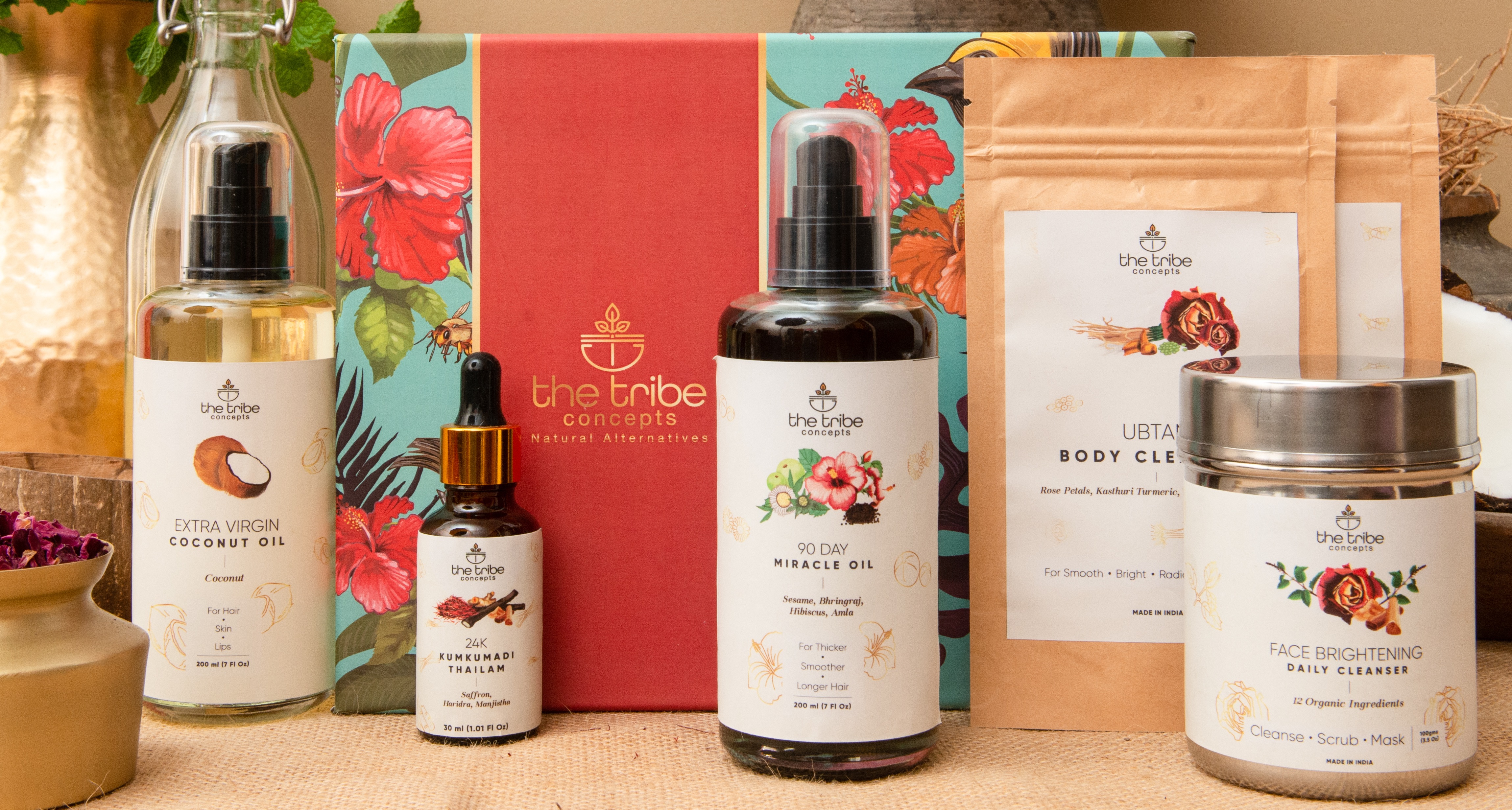 The box includes a 90 day miracle oil, extra virgin coconut oil, 24k Kumkumadi Thailam, face brightening daily cleanser, Ubtan body cleanser and an organic hair cleanser The box includes a 90 day miracle oil, extra virgin coconut oil, 24k Kumkumadi Thailam, face brightening daily cleanser, Ubtan body cleanser and an organic hair cleanser