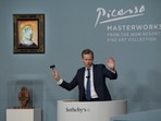 Auctioneer Oliver Barker calls bids as 11 Picasso paintings and works are auctioned at the Bellagio Hotel in Las Vegas, Nevada, in the US, on October 23, 2021.&nbsp;(REUTERS / Bridget Bennett)