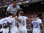 Soccer Football - LaLiga - FC Barcelona v Real Madrid - Camp Nou, Barcelona, Spain - October 24, 2021  Real Madrid's David Alaba celebrates scoring their first goal with Rodrygo, Eder Militao, Toni Kroos and Vinicius Junior REUTERS/Albert Gea