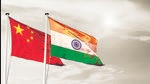 China India national flag cloth fabric waving on the sky with beautiful sun light - Image (Shutterstock) China India national flag cloth fabric waving on the sky with beautiful sun light - Image (Shutterstock)