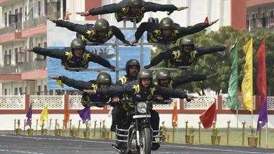 ITBP personnel perform a stunt on the 60th Raising Day, in Greater Noida, on Sunday. (Sunil Ghosh/HT photo) ITBP personnel perform a stunt on the 60th Raising Day, in Greater Noida, on Sunday. (Sunil Ghosh/HT photo)