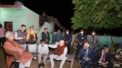 Union home minister Amit Shah with J&K LG Manoj Sinha during a visit to Maqwal, the last village on the border, in Jammu on Sunday. (PTI) Union home minister Amit Shah with J&K LG Manoj Sinha during a visit to Maqwal, the last village on the border, in Jammu on Sunday. (PTI)