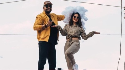 Flaunting a waistline to die for, Sunny teamed the crop hoodie with a pair of old army green joggers that sported side pockets. The ankle length panelled joggers came with a functional side button placket at the bottom rib hem. (Instagram/sunnyleone) Flaunting a waistline to die for, Sunny teamed the crop hoodie with a pair of old army green joggers that sported side pockets. The ankle length panelled joggers came with a functional side button placket at the bottom rib hem. (Instagram/sunnyleone)