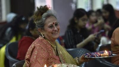 A Hindu married woman performs rituals on the occasion of Karva Chauth at a community centre in Sector 35 in Noida on Sunday. (Sunil Ghosh) A Hindu married woman performs rituals on the occasion of Karva Chauth at a community centre in Sector 35 in Noida on Sunday. (Sunil Ghosh)