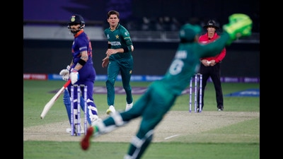 India’s top order was rocked by Pakistan pacer Shaheen Shah Afridi who claimed three wickets to put pressure on Indian batsmen. The lanky bowler took wickets of Rohit Sharma, KL Rahul and Virat Kohli. (REUTERS)