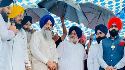 Shiromani Akali Dal president Sukhbir Singh Badal during a dharna against the sale of Barri village land in Mohali on Sunday. (HT Photo)