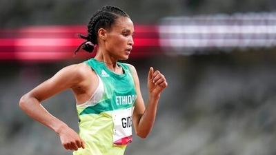 Ethiopia's Gidey breaks half marathon world record (AP)