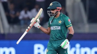 Dubai: Pakistan's cricket captain Babar Azam celebrates after scoring half a century during the Cricket Twenty20 World Cup match between India and Pakistan in Dubai, UAE, Sunday, Oct. 24, 2021.AP/PTI Photo(AP10_24_2021_000205B) (AP) Dubai: Pakistan's cricket captain Babar Azam celebrates after scoring half a century during the Cricket Twenty20 World Cup match between India and Pakistan in Dubai, UAE, Sunday, Oct. 24, 2021.AP/PTI Photo(AP10_24_2021_000205B) (AP)