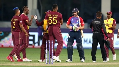 West Indies' Kieron Pollard shakes hands with England's Eoin Morgan after the T20 World Cup match between the two sides.&nbsp; (REUTERS)