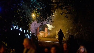 A woman walks on the grounds of Slane Castle during a Halloween festival called 'Puca' celebrating the Celtic tradition of Samhain in Slane, Ireland. (REUTERS)