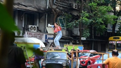 Alia shot the ad while standing atop a cab. Alia shot the ad while standing atop a cab.
