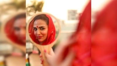 Esha Deol shared a long Instagram post with a photo of just the reflection of her festival-ready face on a mirror and captioned it, "Karwa chauth has a lot more to it than the vermillion on your head or the fast or the tradition; For me, it is the love, the feeling, the spirit of sacrifice and selflessness that I celebrate and cherish. It makes me bask in the feeling of being loved by someone and having someone special in my life to share that love. Although I do follow the ritual of 'fasting' and feasting later on, I believe fast or no fast, it is all about the 'saath' and the celebration of this 'saath' that matters the most. What is it for you?." (Instagram/@imeshadeol)