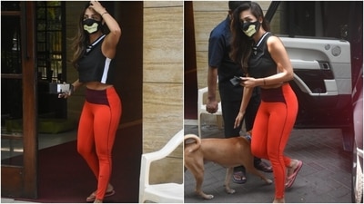 Malaika teamed her ensemble with a printed black face mask and flip flops. She left her locks open in a side-parted style and opted for a bare face to complete the look. (Ht Photo/Varinder Chawla) Malaika teamed her ensemble with a printed black face mask and flip flops. She left her locks open in a side-parted style and opted for a bare face to complete the look. (Ht Photo/Varinder Chawla)