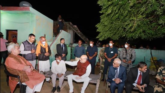 Union home minister Amit Shah with J&K LG Manoj Sinha during a visit to Maqwal, the last village on the border, in Jammu on Sunday. (PTI)