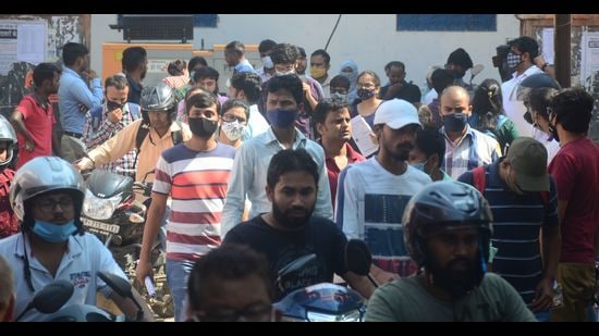 Candidates coming out after appearing in PCS (Prelims)-2021 in Prayagraj on Sunday. (HT PHOTO)