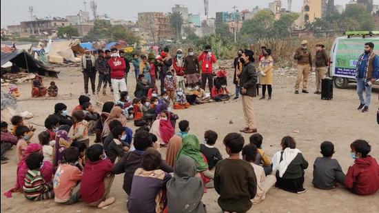 Vrinda Shukla, deputy commissioner of police (DCP) of Gautam Budh Nagar, who also heads the project, interacts with the slum children in Noida on Sunday. (Sourced)