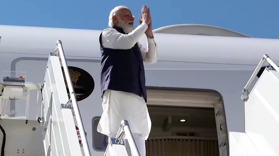 The meeting would be the eighth G20 summit that would be attended by the PM Modi. In picture - PM Modi greets while leaving for India from John F Kennedy International Airport in New York after concluding his US visit. (ANI)