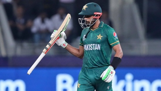 Dubai: Pakistan's cricket captain Babar Azam celebrates after scoring half a century during the Cricket Twenty20 World Cup match between India and Pakistan in Dubai, UAE, Sunday, Oct. 24, 2021.AP/PTI Photo(AP10_24_2021_000205B)(AP)