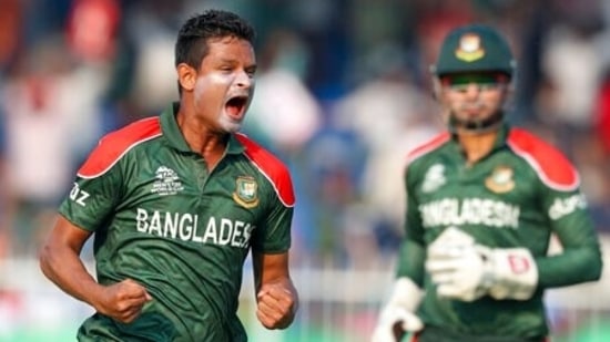 Bangladesh's Nasum Ahmed reacts after taking the wicket of Sri Lanka's Kusal Perera during the Cricket Twenty20 World Cup match between Sri Lanka and Bangladesh in Sharjah, UAE, Sunday, Oct. 24, 2021. (AP)