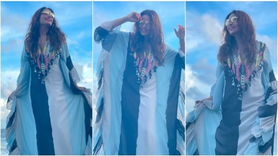 Bipasha Basu's Maldives lookbook is all about beautiful and vibrant Kaftans. Since the day the Bengali beauty reached the Maldives, the actor has only been wearing stylish designer Kaftans and has been acing all of them. Recently, she shared a few more stills of herself in a broad striped ruffled Kaftan.(Instagram/@bipashabasusinghgrover)
